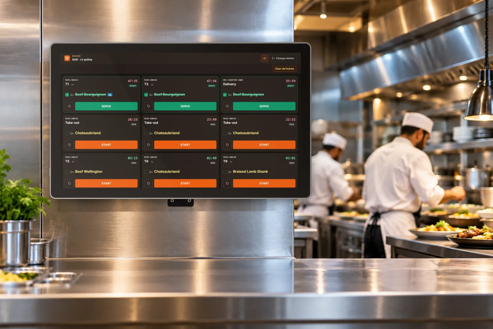 Wall-mounted kitchen display in a professional kitchen